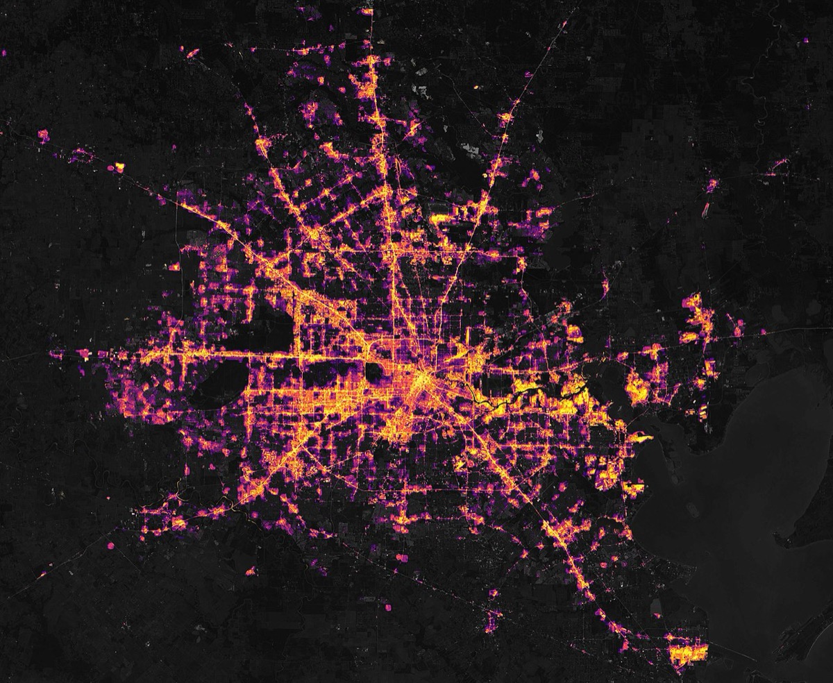 NASA satellite image of Houston Texas on 7 February 2021 showing the city in near-darkness during the Winter Storm Uri power grid failure that froze the Gulf Coast chemical corridor