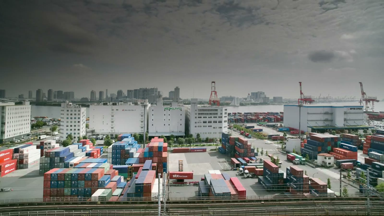 A cargo port from above, thousands of boxes a day.